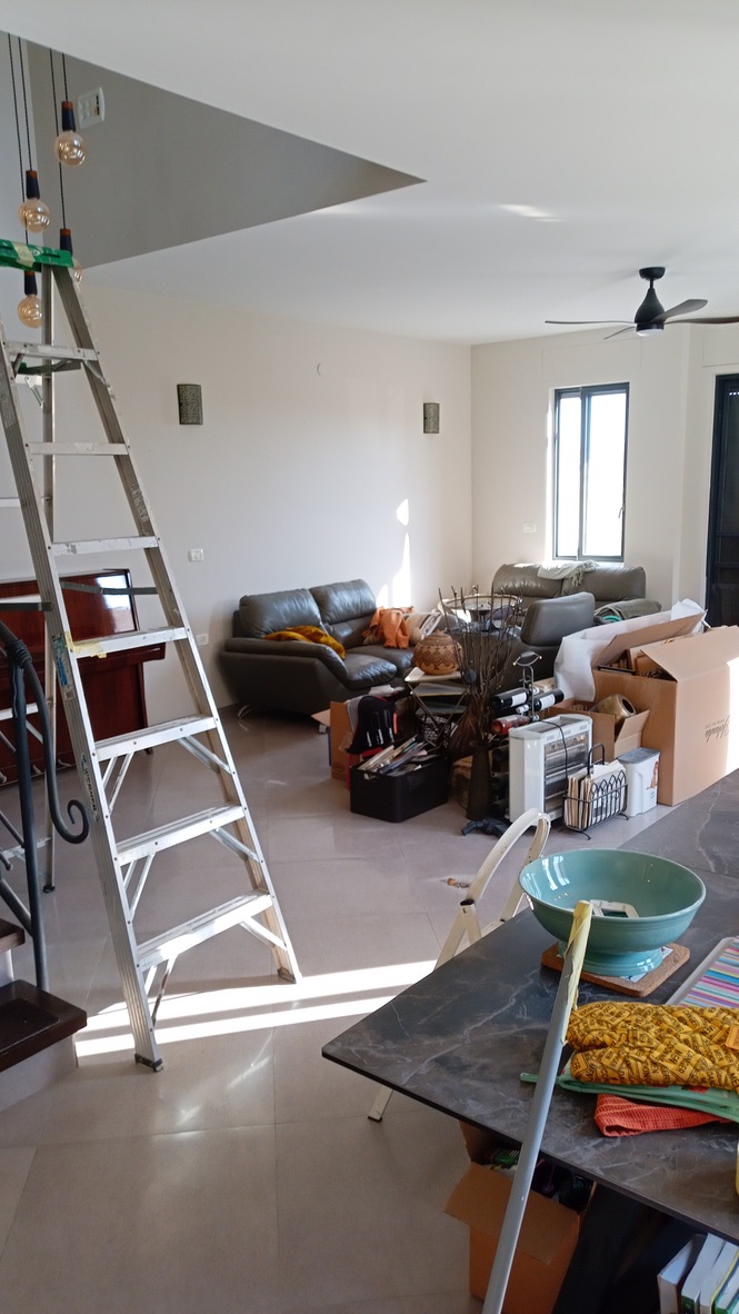 Living room set up for interior painting work